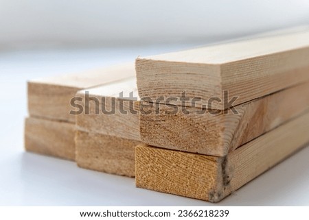 Close up of ready prepared pine wood timber. Royalty-Free Stock Photo #2366218239