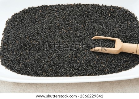 Selasih or basil seed, is a spice from the basil plant, background textured
 Royalty-Free Stock Photo #2366229341