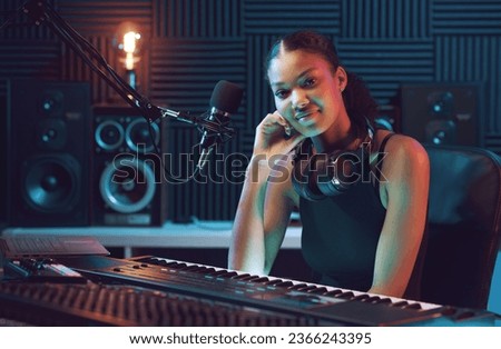Young musician working in the recording studio, entertainment and creativity concept