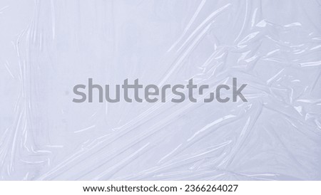 wrinkled plastic texture background, transparent plastic warp paper for mockup design isolated on white Royalty-Free Stock Photo #2366264027