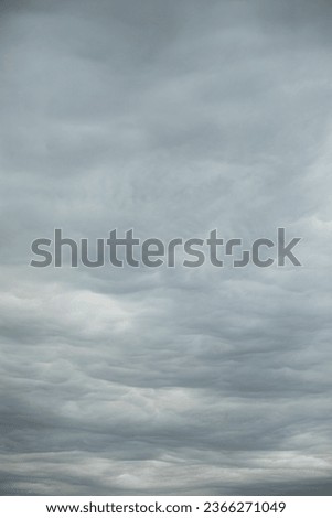 Gray clouds. Low clouds. Gloomy sky. Cloudy weather. Royalty-Free Stock Photo #2366271049