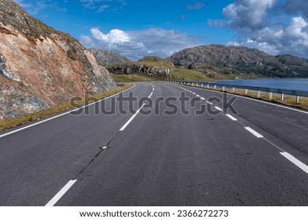 Driving on the scenic route North Coast 500, Scotland, near Loch Droma