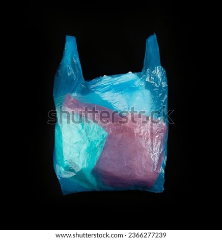 Many Plastic Bags on Black Background, Crumpled Plastic Bag after Shopping, Cellophane Packaging Waste, Used Crumpled Disposable Pouch Royalty-Free Stock Photo #2366277239