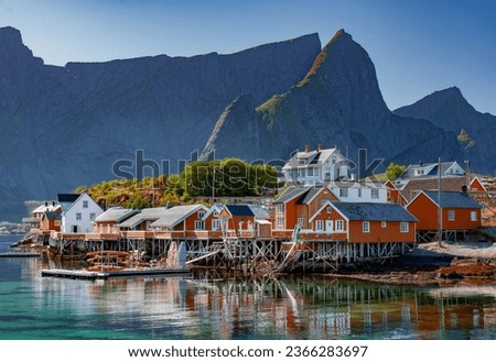 a small town in the Lofoten Islands with visible fishermen's houses, traditional rorbu Royalty-Free Stock Photo #2366283697