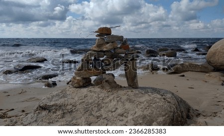 Stone pyramid on the beach 