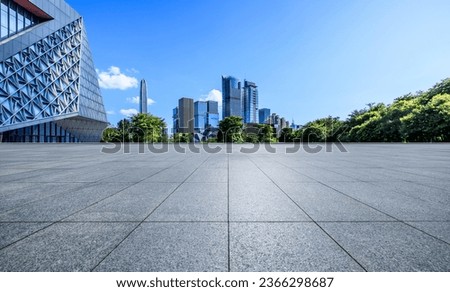 Empty square floor and city skyline with modern buildings in Shenzhen, China. 
