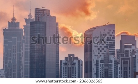 Dubai skyscrapers with golden sunset over business bay district. Aerial view from of downtown in United Arab Emirates. Colorful clouds Royalty-Free Stock Photo #2366326565