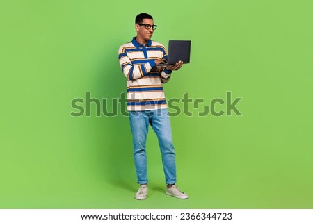 Full body size photo of young confident businessman working freelance shopify website advertiser smm isolated on green color background