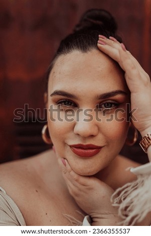 A close-up, unretouched portrait of a naturally beautiful young woman showcasing her authentic and unaltered facial features, capturing the essence of real beauty without any digital enhancements.