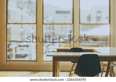 This is a kind of picture with high quality with beautifull and nice backgroung with two chairs placed in front.