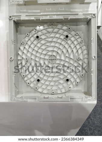 White fan cover for the big generator