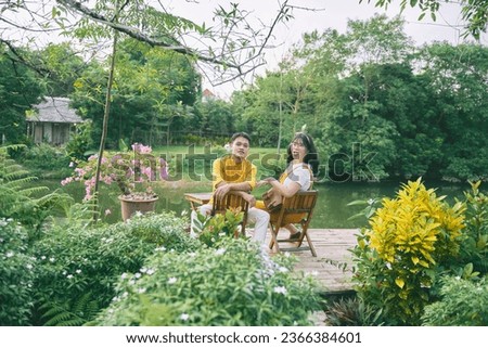 vietnamese couple pre wedding photo shot in resort Hoa binh. Yellow and pink and white custume