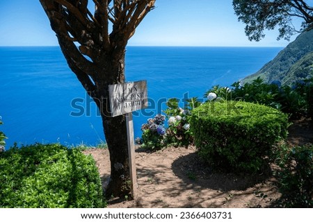 "Don't step into the garden" sign at the lookout of Miradouro Da Ponta Sossego, San Miguel Island, The Azores, Portugal	