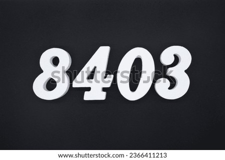 Black for the background. The number 8403 is made of white painted wood.