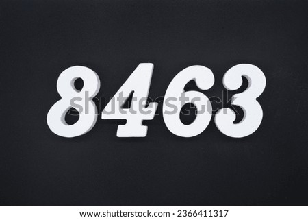 Black for the background. The number 8463 is made of white painted wood.