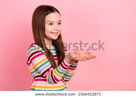 Side photo of little child girl holding palms asking parents buy her new backpack give money look novelty isolated on pink color background