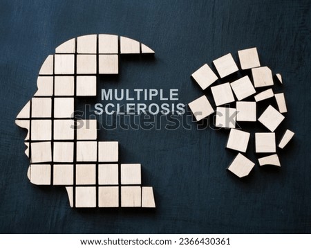 Multiple sclerosis concept. Head is made of cubes and several have fallen off. Royalty-Free Stock Photo #2366430361