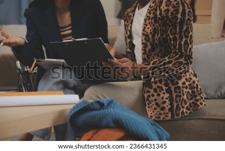 Business woman with friend working online for selling and e-commerce business. Freelancer at home for startup and SME entrepreneur.