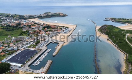 Aerial view of Suances town, its beach, San Martín de la Arena estuary, and the Atlantic Ocean. River Saja. Suances, central coast of Cantabria, Spain.