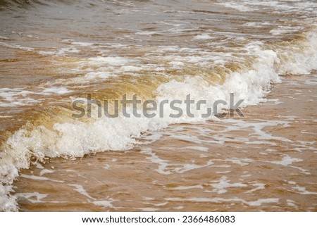 Atmospheric landscapes Dramatic Baltic Sea, waves and water splashes. Environment with volatile weather, climate change. Stormy, abstract backgrounds. The Gulf of Riga