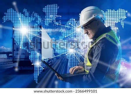 Logistics specialist. Male manager of transport company. Logistics company employee. Truck near man with laptop. World map is metaphor for international logistics. Transport dispatcher in hardhat Royalty-Free Stock Photo #2366499101