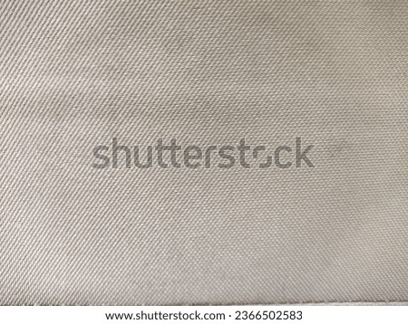 close up of the fabric on a car seat texture background