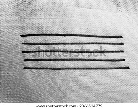 Five lines stitched on to a cloth. Royalty-Free Stock Photo #2366524779