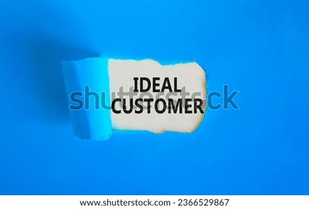 Ideal customer symbol. Concept words Ideal customer on beautiful white paper. Beautiful blue paper background. Business ideal customer concept. Copy space.
