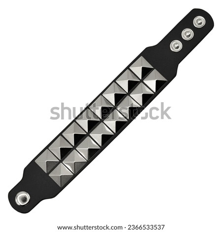 Black leather bracelet with spikes, pyramids. An accessory for rockers, bikers, metalheads, goths and punks. Steampunk style. Close-up subject photography. Royalty-Free Stock Photo #2366533537