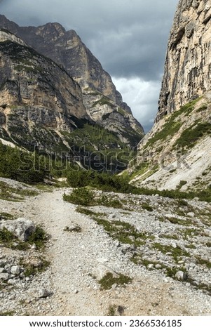 Valley Val Travenanzes and path way rock face in Tofane gruppe, Alps Dolomites mountains, Fanes national park, Italy Royalty-Free Stock Photo #2366536185