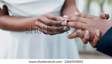 Couple, holding hands and ring for marriage, commitment or wedding in ceremony, love or support. Closeup of people getting married, vows or accessory for symbol of bond, relationship or partnership Royalty-Free Stock Photo #2366543065