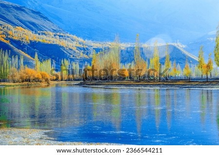 Lake in the autumn forest. Autumn forest lake. Autumn lake water reflection. Autumn forest lake view Royalty-Free Stock Photo #2366544211