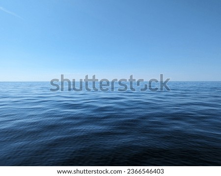 The ocean is calm and flat