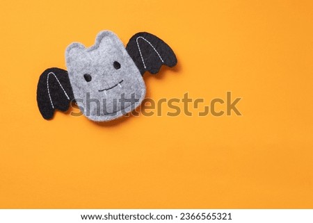 halloween and decoration concept - black bats toy