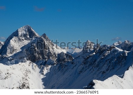 First snow on the alpine peak Pizzo del Diavolo di Tenda one of the highest alpine peaks in the Orobie range ( Bergamo Alps ), Lombardy, Italy Royalty-Free Stock Photo #2366576091