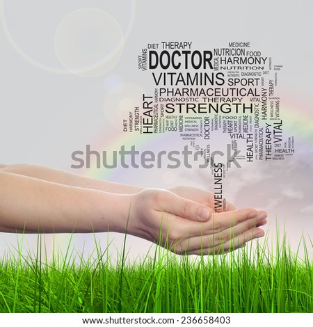 Concept conceptual black text word cloud tagcloud as tree in man or woman hand on rainbow sky background and grass, metaphor to health, nutrition, diet, body, energy, medical, sport, heart science
