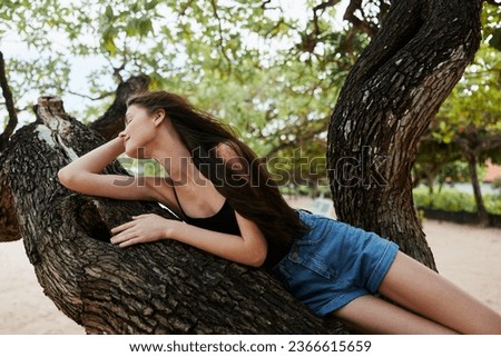 woman sitting horizon relax sky lifestyle smiling nature vacation tree sea