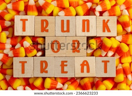 Trunk or Treat sign with a Background of Classic Candy Corn Royalty-Free Stock Photo #2366623233