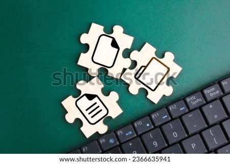 laptop keyboard and puzzle with file and folder icons. DMS concept. Documents management system. file management or file arrangement