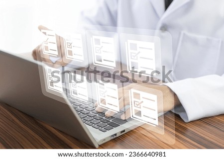 Doctor using computer Document Management System (DMS), online documentation database process automation to efficiently manage files	
