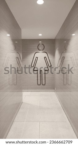  Women's toilet sign on the wall.