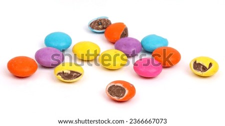 gems, chocolate balls on white background, new angles  Royalty-Free Stock Photo #2366667073