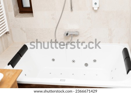 Picture of a jacuzzi bathtub in bathroom of apartment