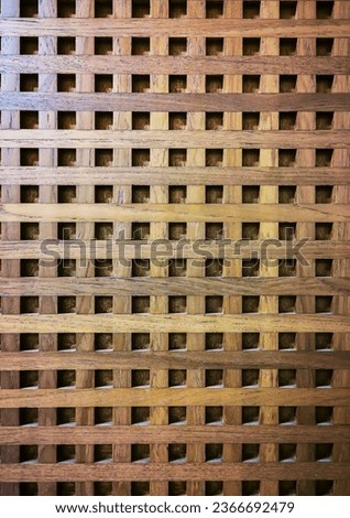 Wooden lattice grid pattern square holes background, Woodwork timber decorative fence. 