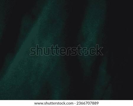photo of dark green fabric