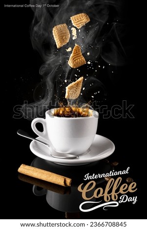 International Coffee Day. A cup of coffee and biscuit with black background. A morning breakfast.