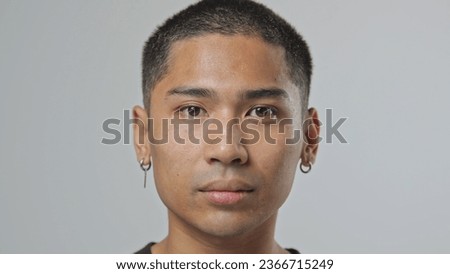 Sad 20s japanese person look camera. 30 years old upset chinese guy. Nice asian unhappy young adult man face portrait close up. One cute korean male teen. Asia china model life. Japan youth. Korea z Royalty-Free Stock Photo #2366715249