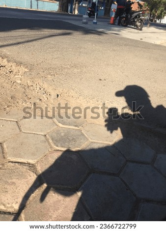Background Shadow of a person on the ground