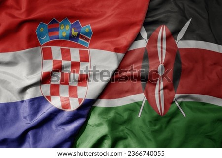 big waving national colorful flag of croatia and national flag of kenya . macro