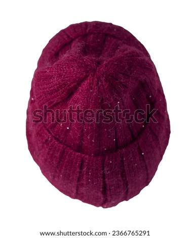 burgundy hat isolated on white background .knitted hat . Royalty-Free Stock Photo #2366765291
